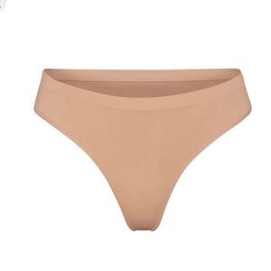SKIMS Fits Everybody Soft Smoothing Seamless Thong In Ochre Nude